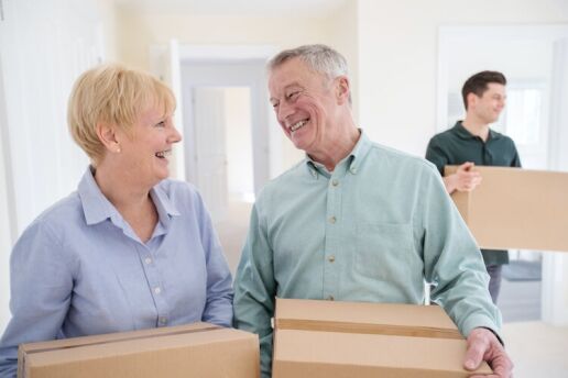 Senior couple downsizing their home for retirement.